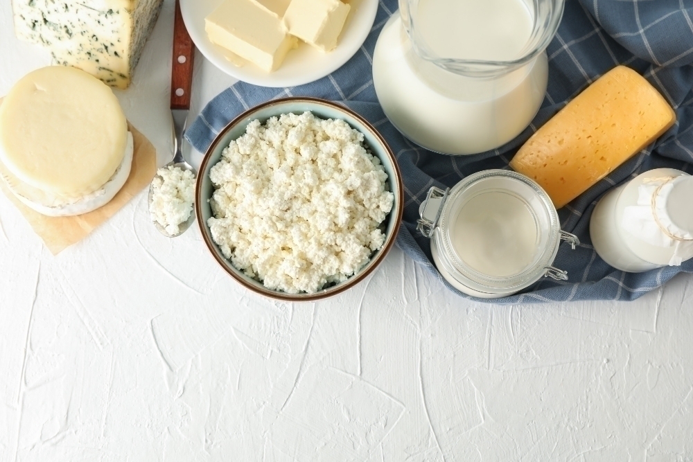 Different dairy products on white background