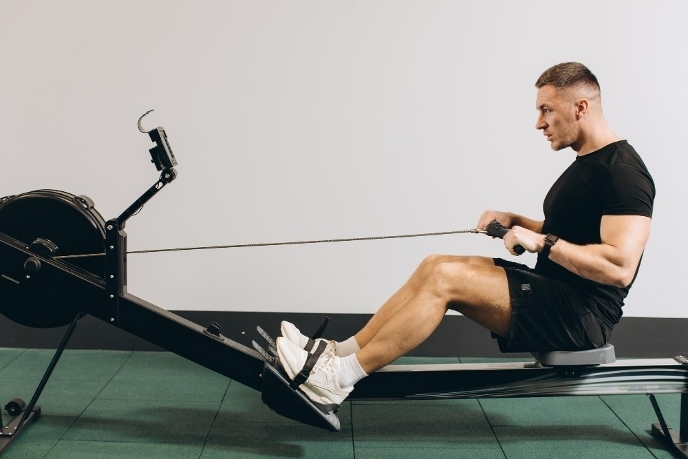 Man rowing excercise in the gym