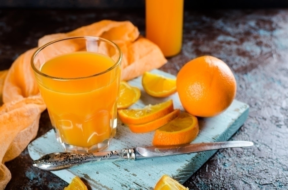 Orange juice on table