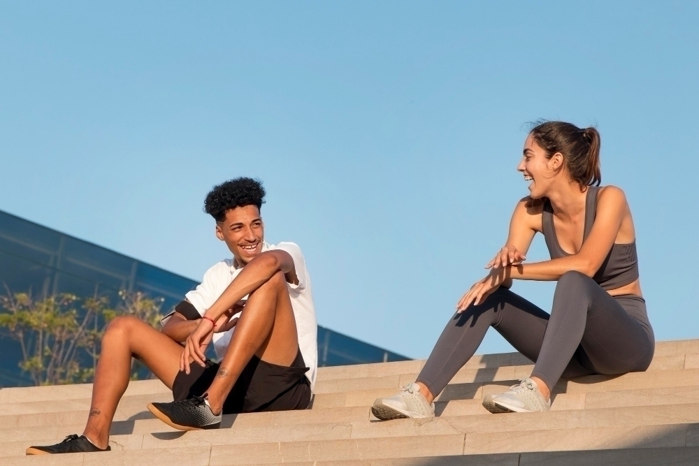 Young adults doing outdoor fitness