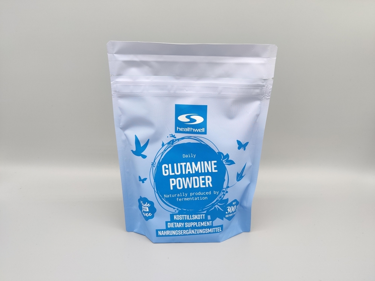 Healthwell Glutamine Powder mot neutral bakgrund, fotat av oss