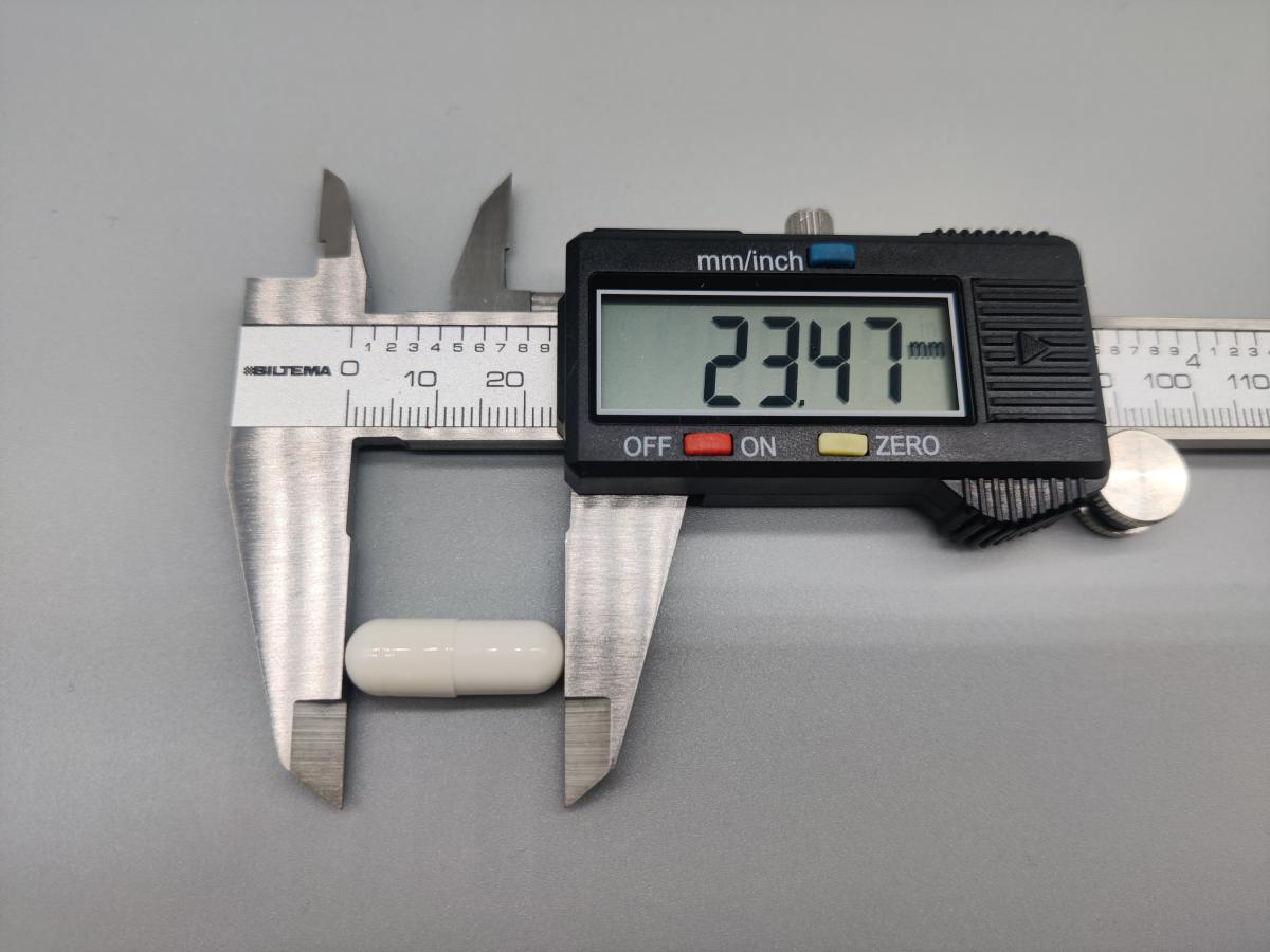 Mätning av Body Science D-vitamin kapsel med skjutmått 23,47 mm