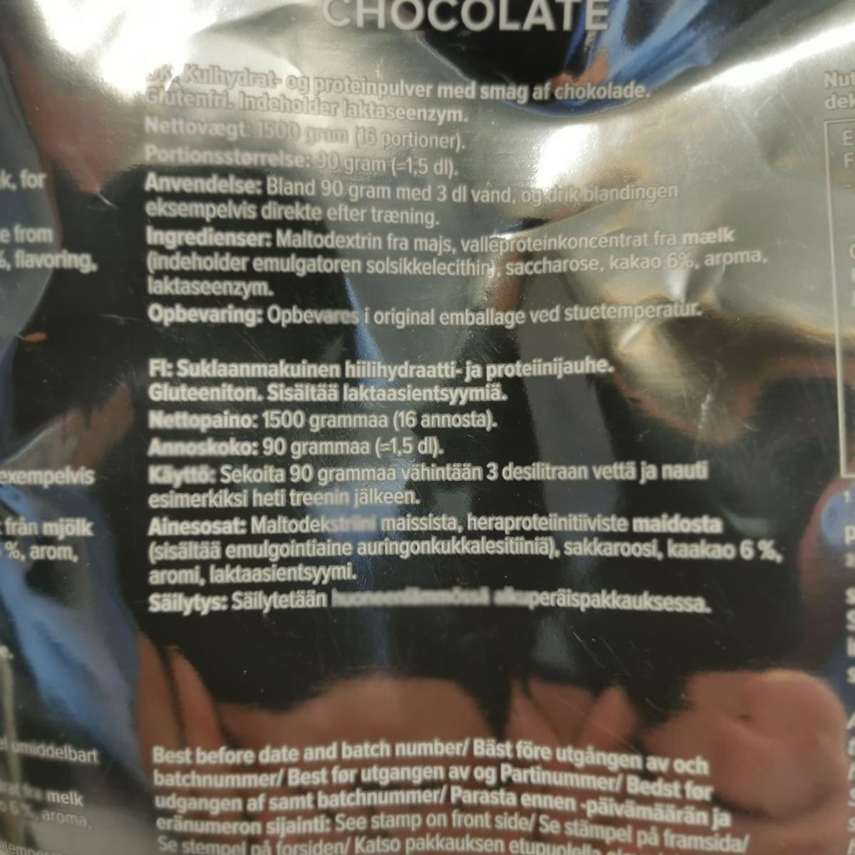 Detalj av flerspråkig panel med dosering 90 g vårt foto