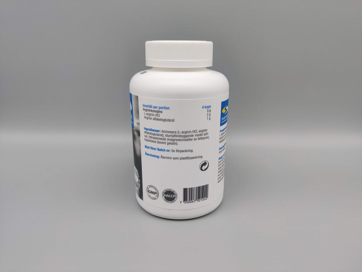 Närbild av innehållsetikett och dosering på Core Arginine Complex