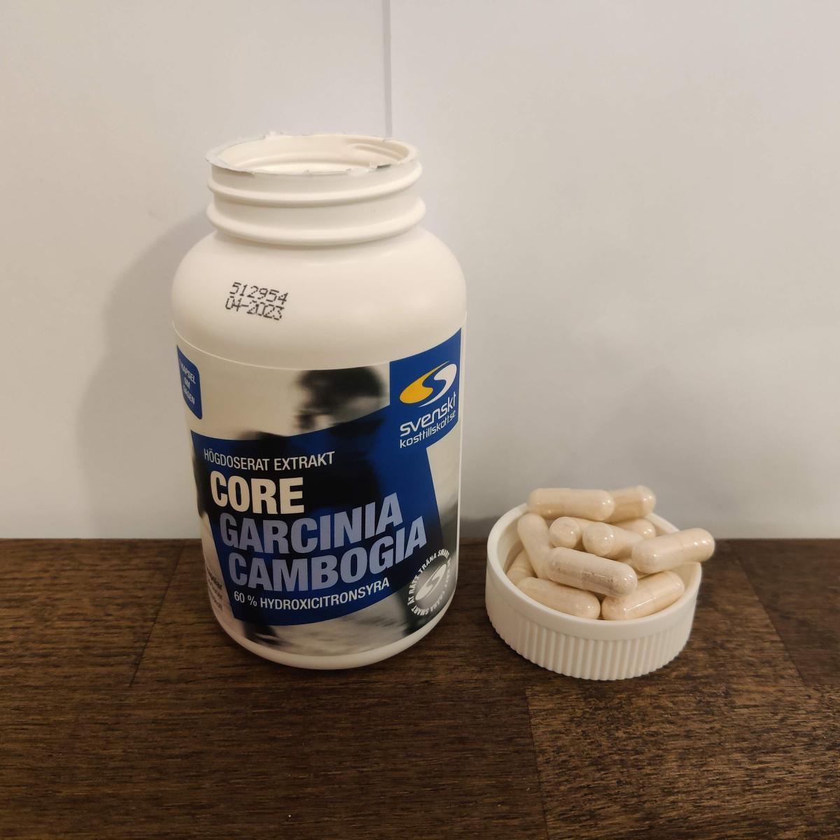Skjutmått visar kapselns längd cirka 23 mm