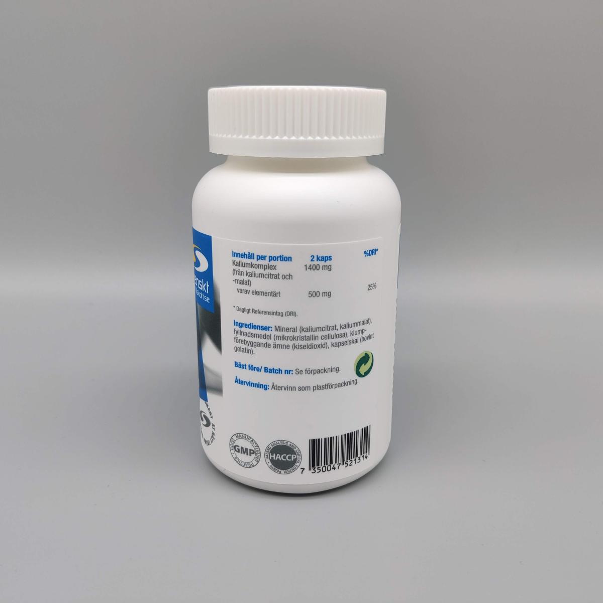 Etikettens baksida visar 2 kapslar per portion med 500 mg elementärt kalium