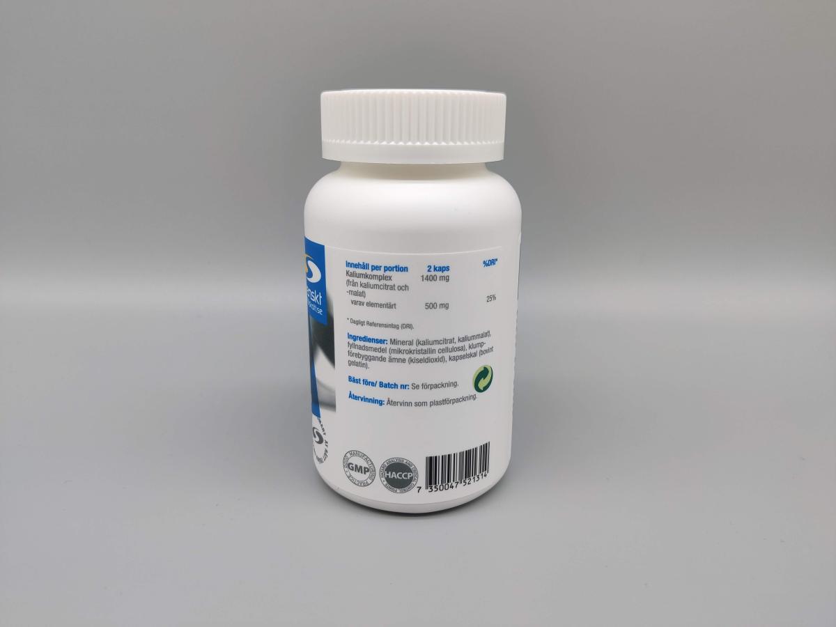 Etikettens baksida visar 2 kapslar per portion med 500 mg elementärt kalium