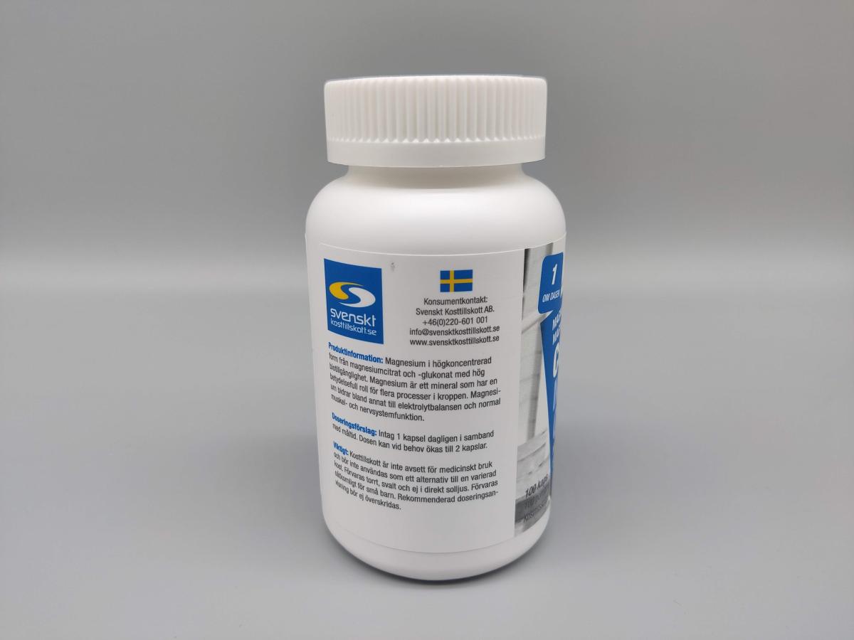 Baksida med produktinformation och konsumentkontakt på Core Magnesium Citrat