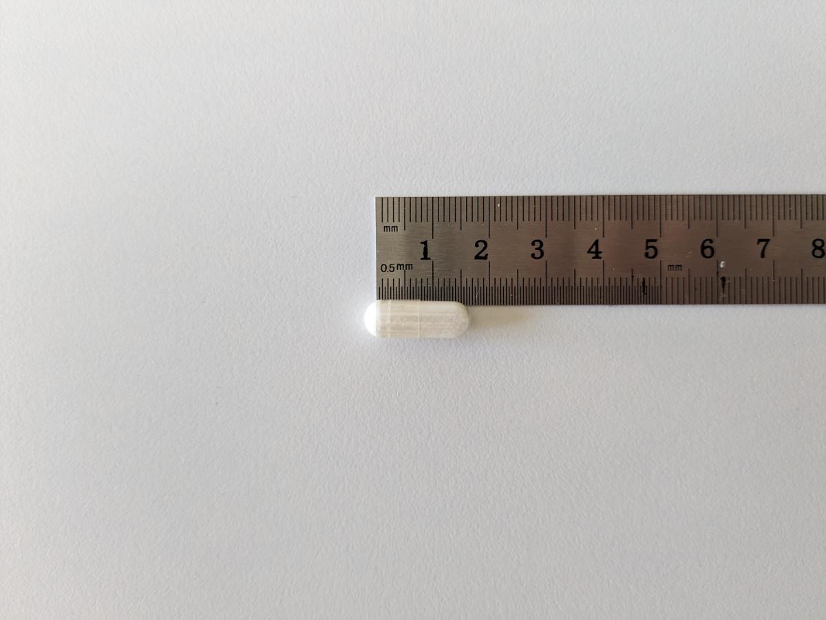 Kapsel från Core Selen 200 uppmätt mot linjal cirka 1,9 cm fotad i vårt test
