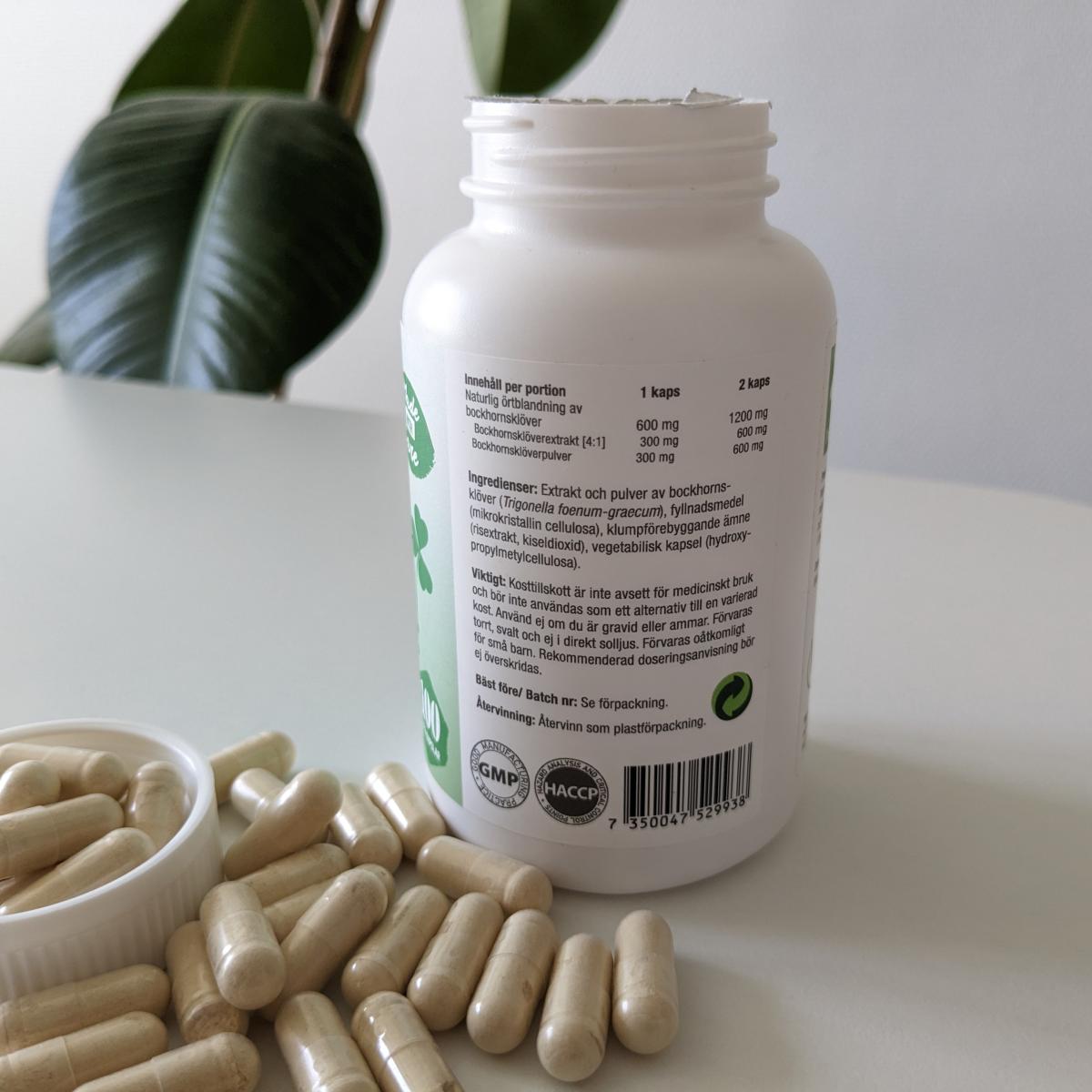Baksida med innehållsdeklaration på Healthwell Bockhornsklöver, 600 mg per kapsel inklusive 4 1-extrakt, från vårt test