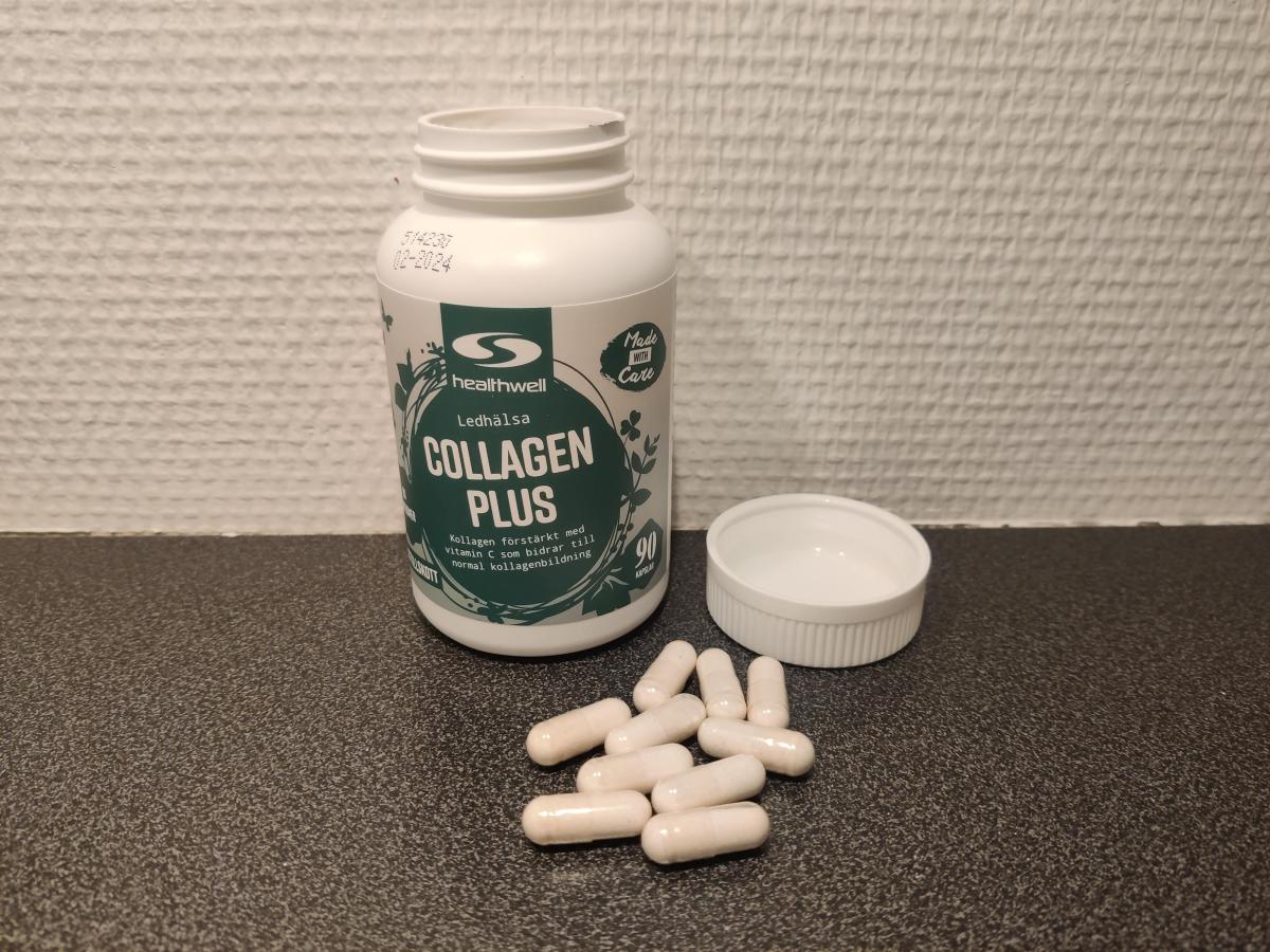 Healthwell Collagen Plus öppnad burk och kapslar på vår testbänk, foto taget av oss under testet
