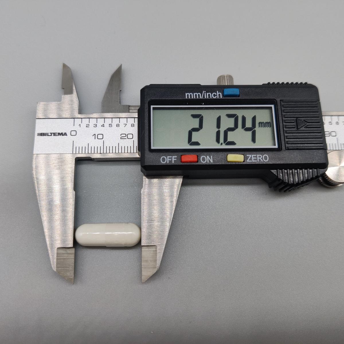 Baksidan av burken med innehållsdeklaration och 400 µg per kapsel, foto från vår burk