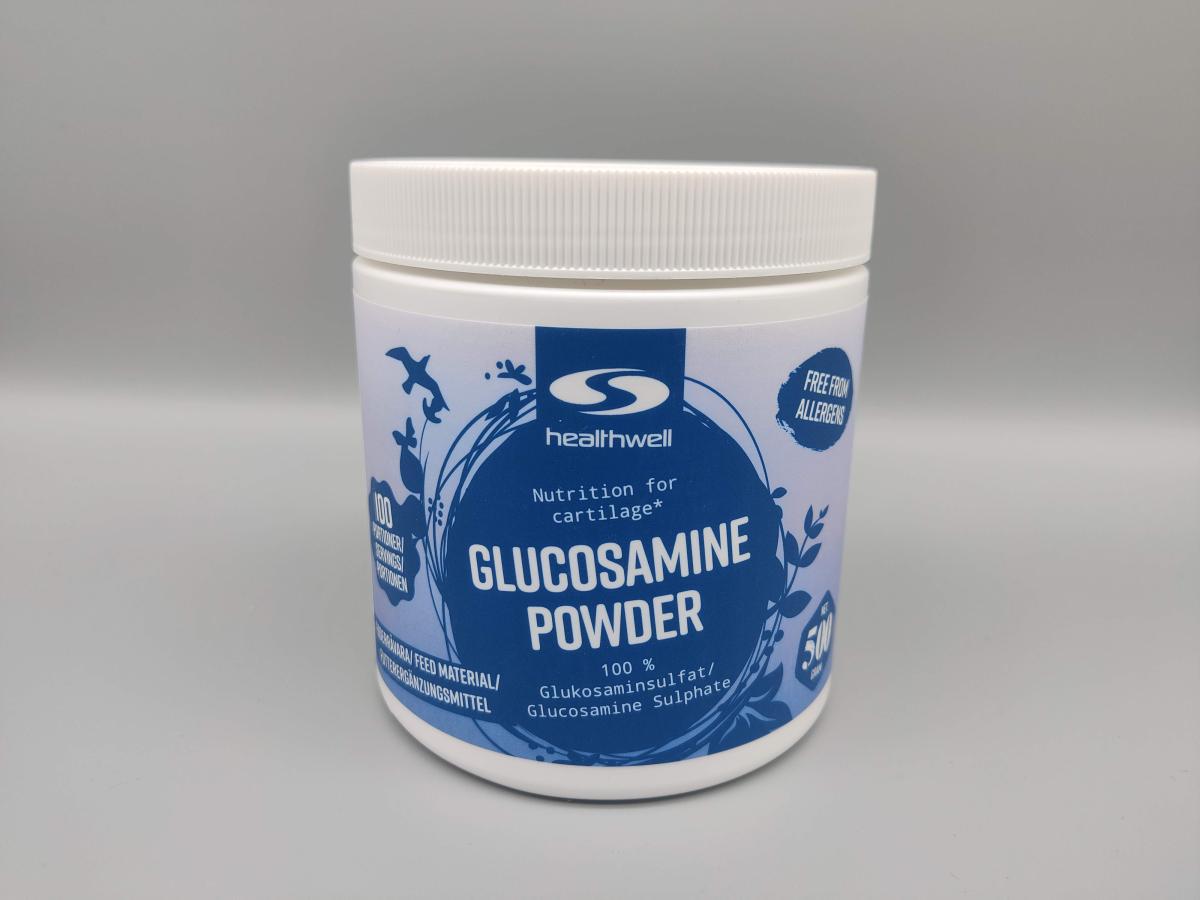 Frametikett på Healthwell Glucosamine Powder mot neutral bakgrund