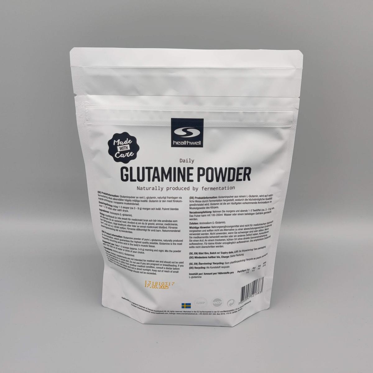 Baksida av Healthwell Glutamine Powder med innehåll och dosering, foto av oss