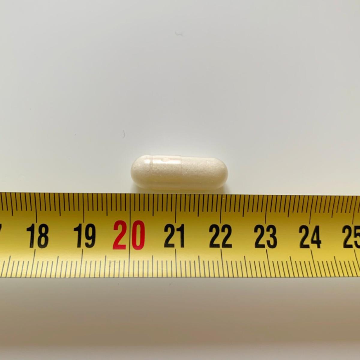 Healthwell Kalium 750 kapsel mätt till cirka 21 mm, vår mätning