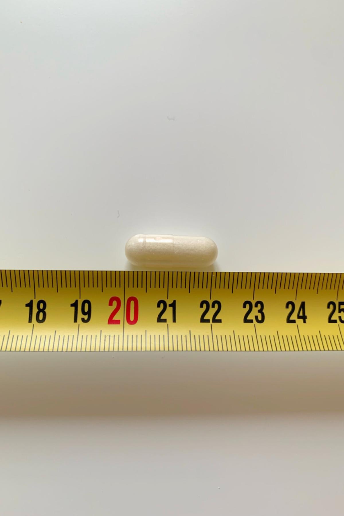 Healthwell Kalium 750 kapsel mätt till cirka 21 mm, vår mätning