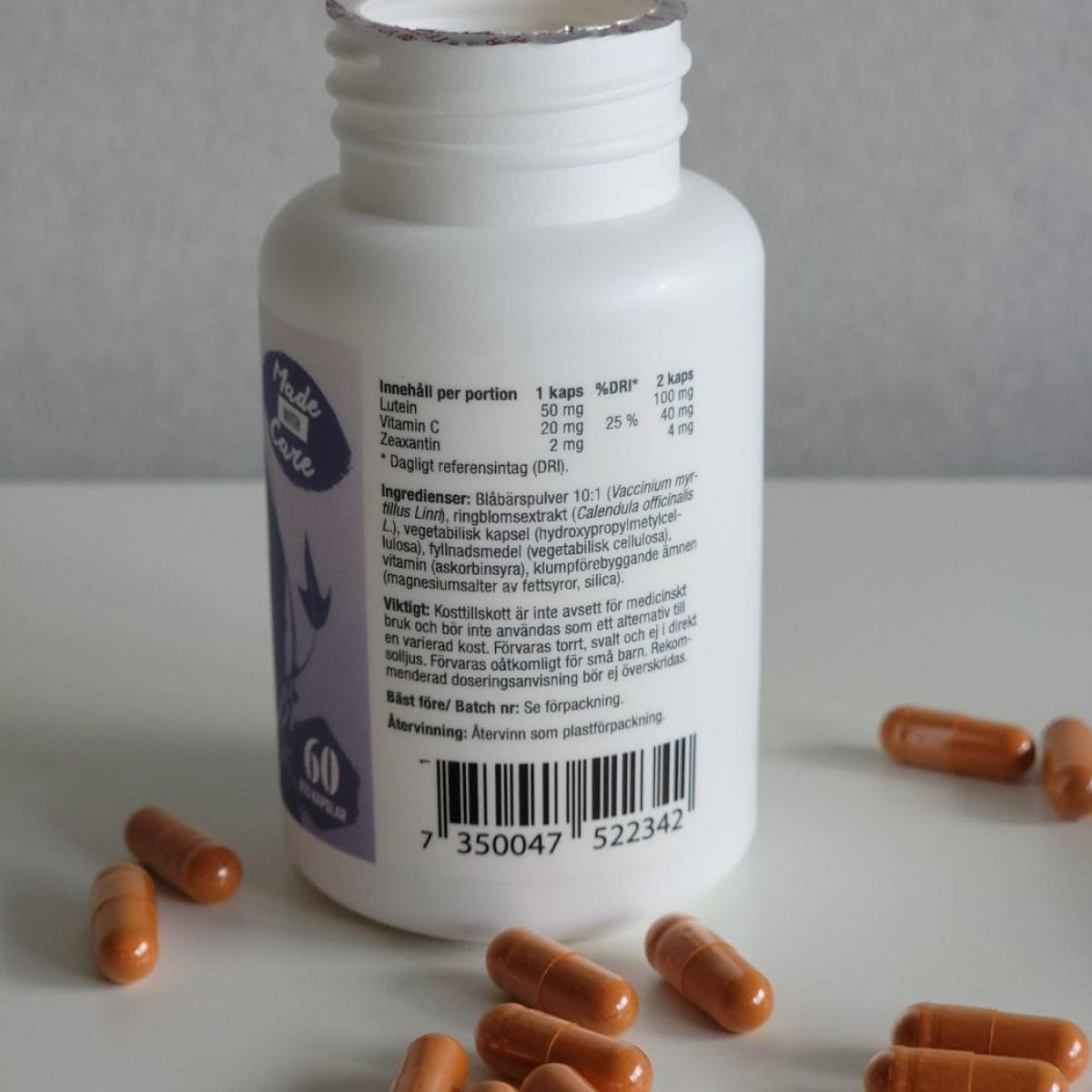 Healthwell Super Lutein baksida med dosering och veganmärkning