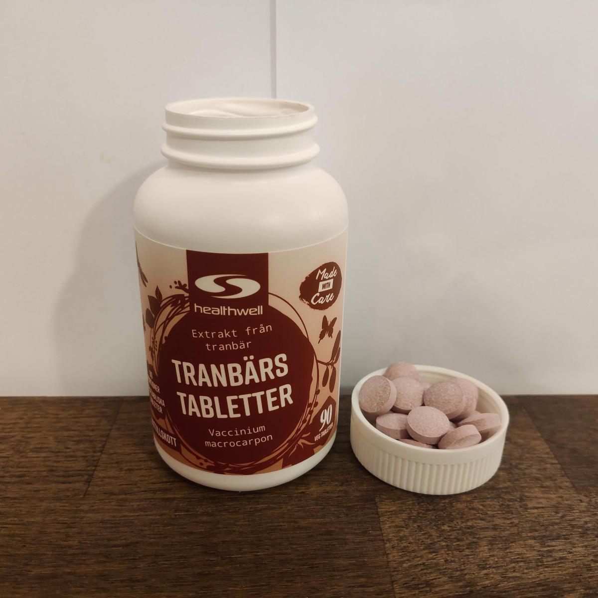 Skjutmått visar 13,06 mm diameter på en tranbärstablett