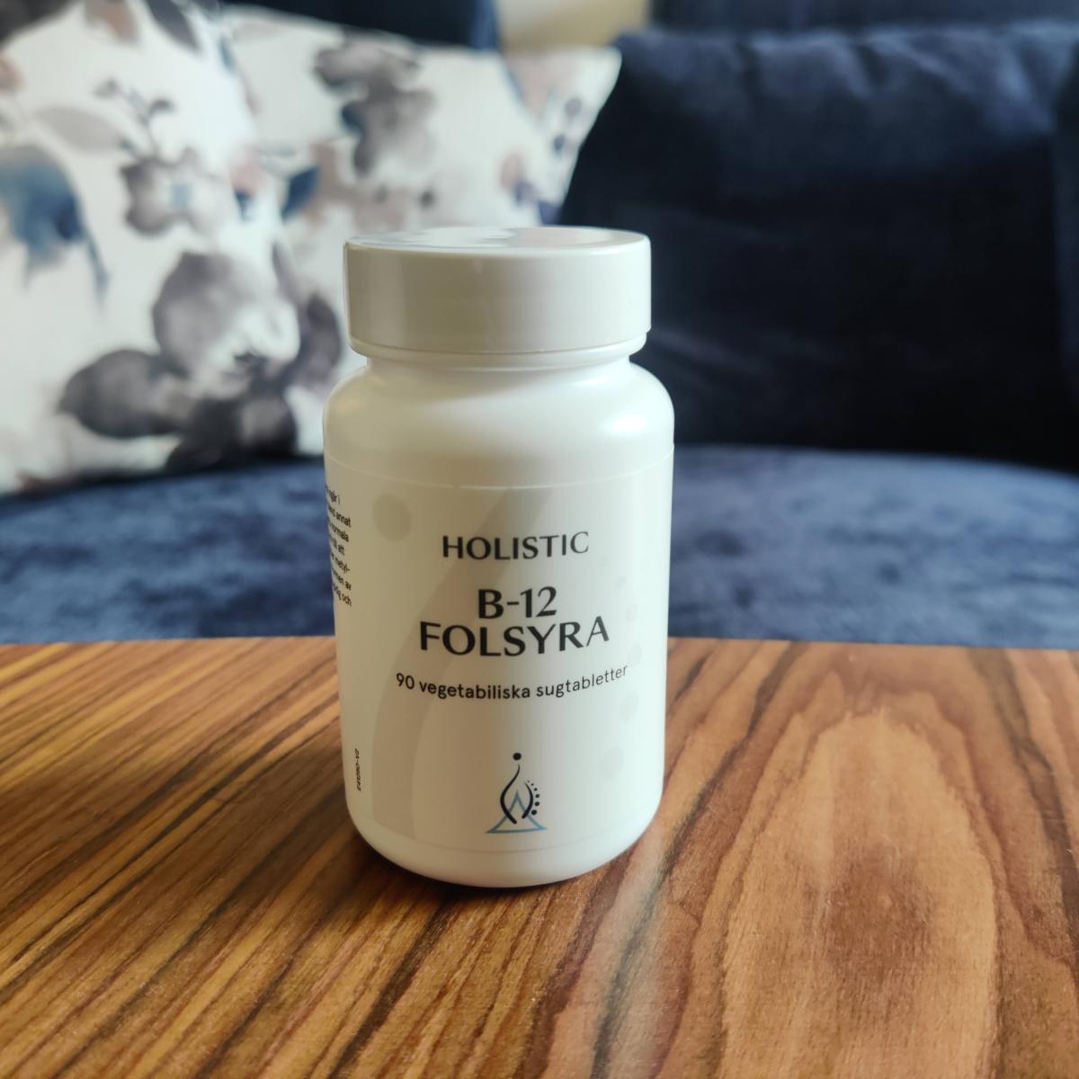 Holistic B12 Folsyra på soffbordet i hemmamiljö foto av oss