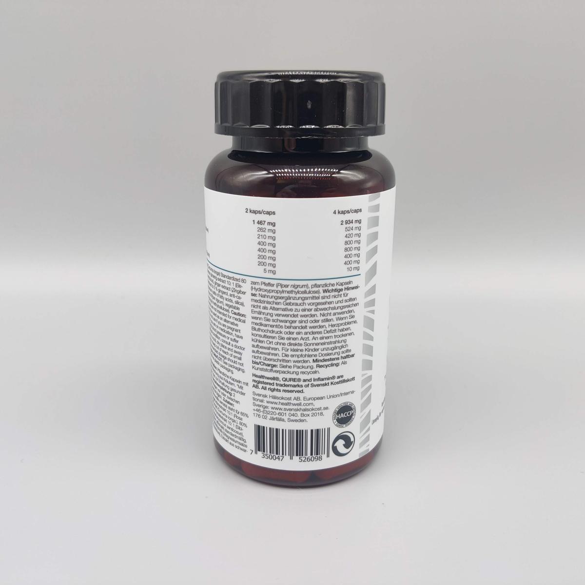 Baksidan med tydliga mg-siffror per 2 och 4 kapslar på Inflamin Premium, fotad av oss
