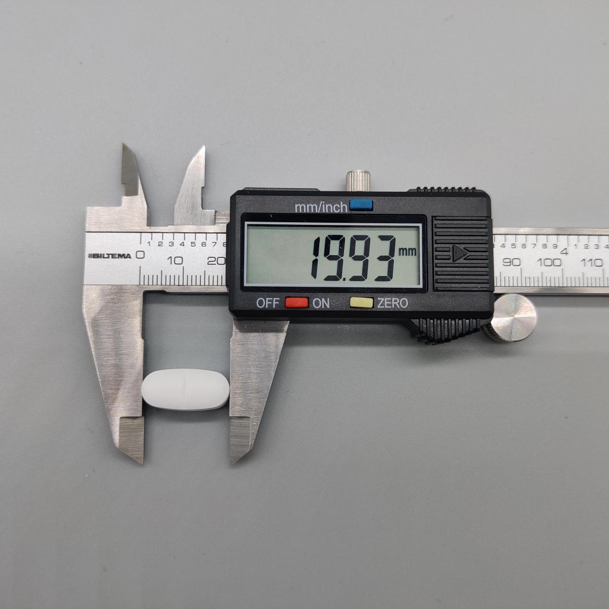 Vår mätning visar cirka 20 mm längd på tabletten