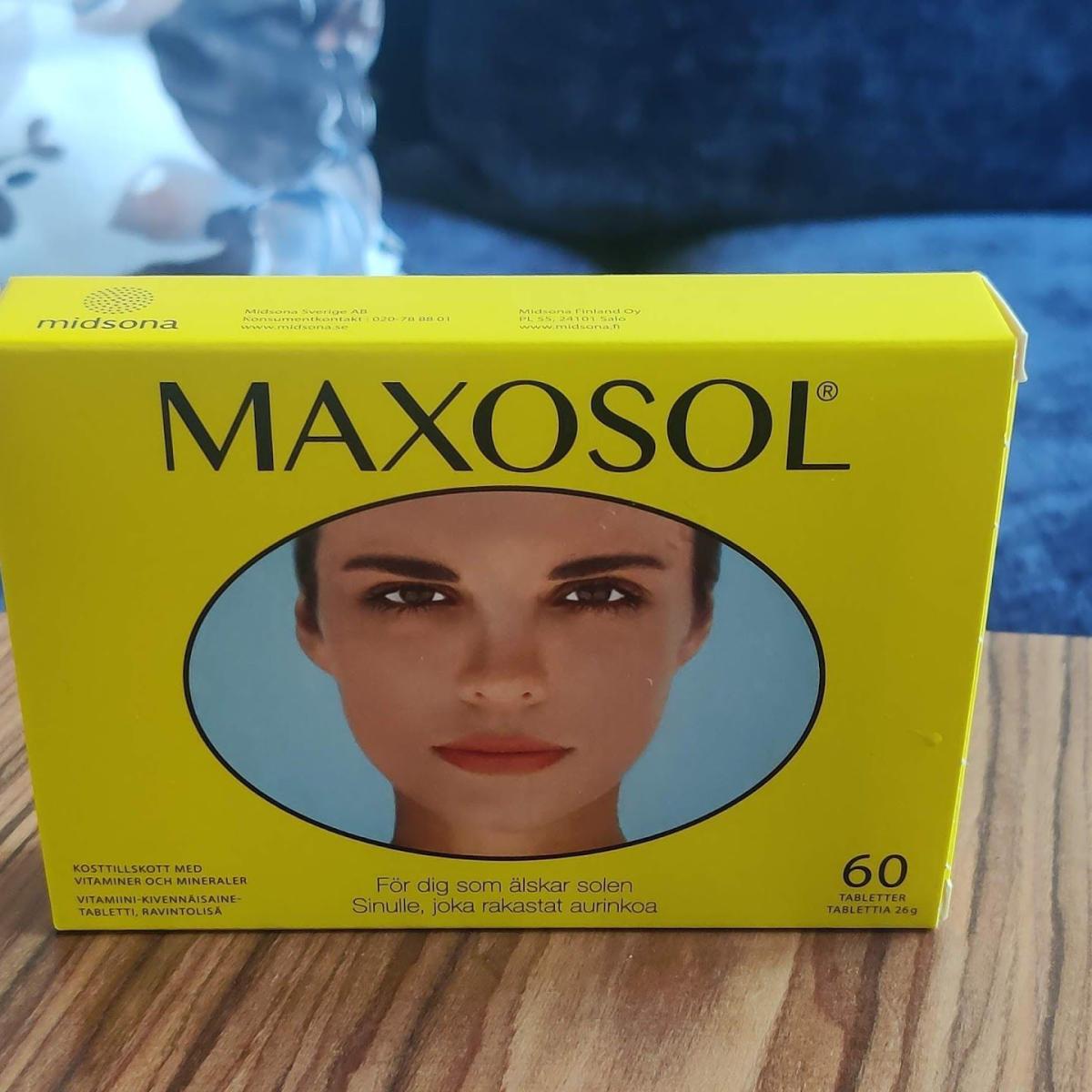 Maxosol-ask på textil under lugnt kvällsljus, foto taget av oss