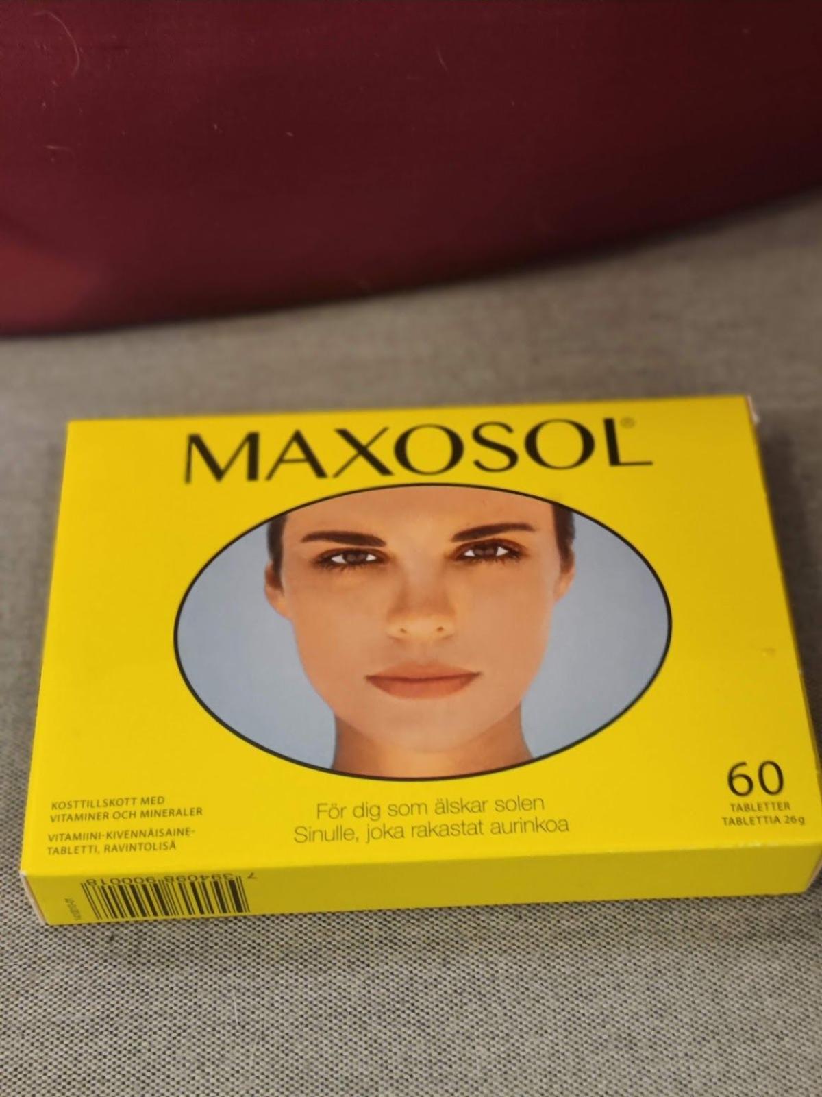 Maxosol-ask på textil under lugnt kvällsljus, foto taget av oss
