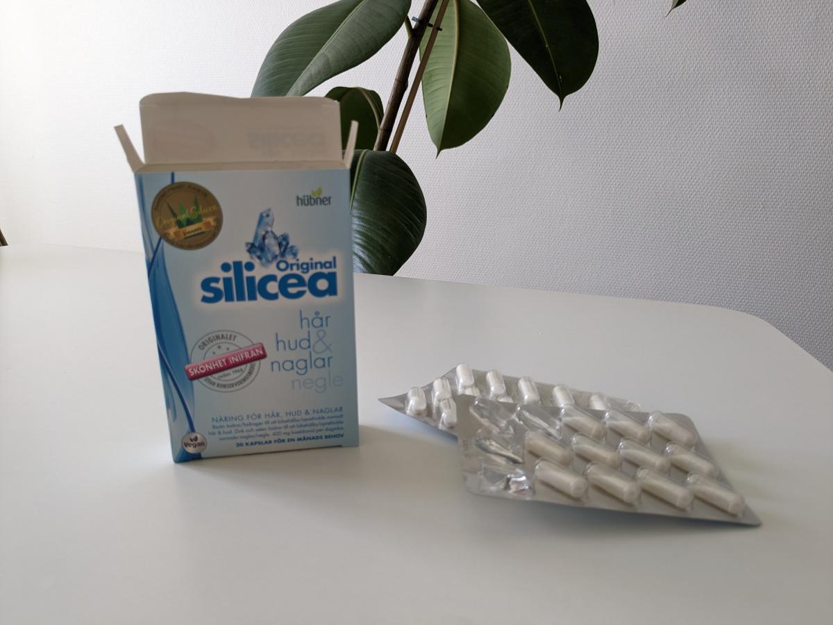 Original Silicea förpackning med öppnad ask och blister på bord, taget av oss