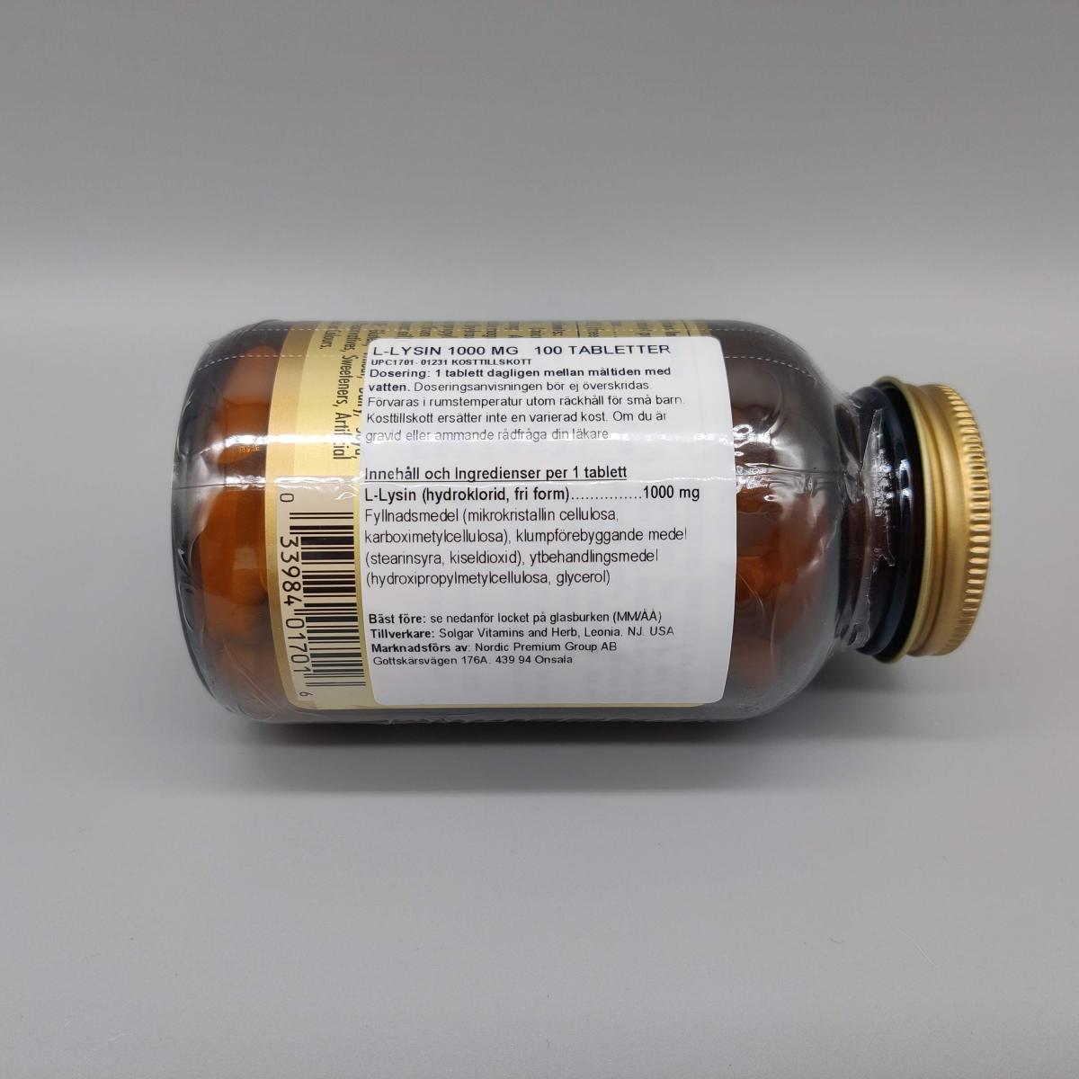 Solgar L-Lysine 1000 mg etikett med ingredienser i fokus, foto av oss